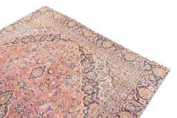 Surface texture of 1977s Vintage rug with natural Wool and intricate pattern