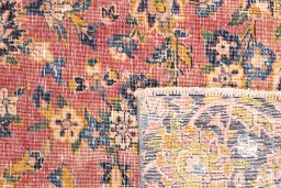 Close-up detail of 1977s Vintage rug from Iran / Persia showing Wool weave
