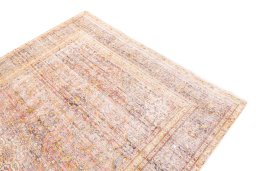 Surface texture of 1975s Vintage rug with natural Wool and intricate pattern