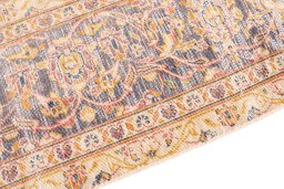 Backside of handmade 1975s Vintage rug showing knot structure and weave density