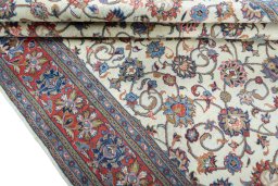 Close-up detail of 2000s Sarough rug from Iran / Persia showing Wool weave