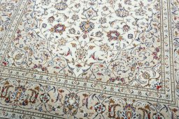 Close-up detail of 2000s Kashan rug from Iran / Persia showing Wool weave