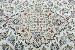 Central medallion detail of 2000s Kashan rug from Iran / Persia