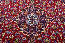 Central medallion detail of 2000s Kashan rug from Iran / Persia