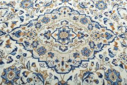 Central medallion detail of 2000s Kashan rug from Iran / Persia