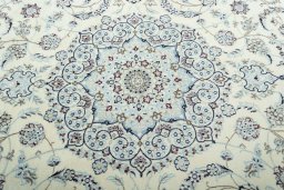 Central medallion detail of 2000s Nain rug from Iran / Persia