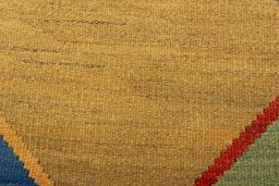 Backside of handmade New Modern Design rug showing knot structure and weave density