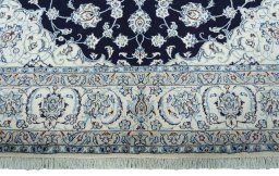 Full view of New Nain rug from Iran / Persia, 338 × 250 cm in Blue tones