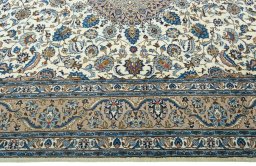 Corner detail of 2000s Kashmar rug showing border pattern and Wool pile