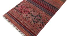 Backside of handmade New Samarkand rug showing knot structure and weave density