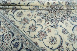 Close-up detail of 2000s Nain rug from Iran / Persia showing Wool weave