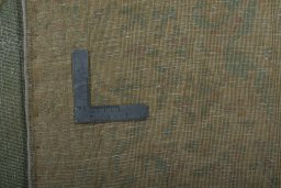 Backside of handmade 1970s Vintage rug showing knot structure and weave density