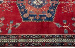 Full view of 2000s Sirjan rug from Iran / Persia, 232 × 168 cm in Red tones