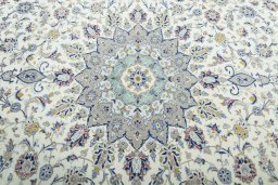 Central medallion detail of 2000s Kashan rug from Iran / Persia