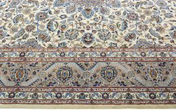 Corner detail of New Kashmar rug showing border pattern and Wool pile
