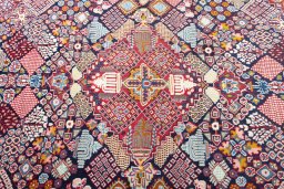 Central medallion detail of 2000s Kashan rug from Iran / Persia