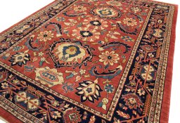 Backside of handmade New Farahan rug showing knot structure and weave density