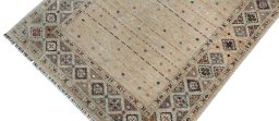 Backside of handmade New Samarkand rug showing knot structure and weave density