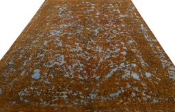 Surface texture of 1970s Vintage rug with natural Wool and intricate pattern