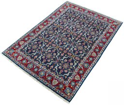 Corner detail of 2000s Najafabad rug showing border pattern and Wool pile