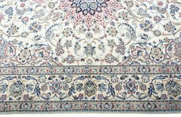 Corner detail of 2000s Nain rug showing border pattern and Wool pile
