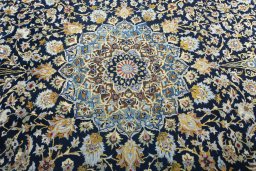 Central medallion detail of 2000s Kashan rug from Iran / Persia
