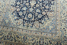 Close-up detail of 2000s Nain rug from Iran / Persia showing Wool weave