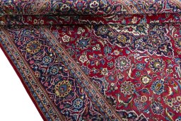 Close-up detail of New Kashan rug from Iran / Persia showing Wool weave
