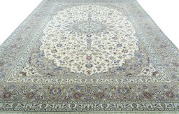 Surface texture of 2000s Kashan rug with natural Wool and intricate pattern