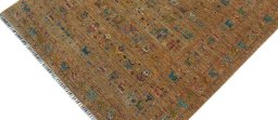 Backside of handmade New Samarkand rug showing knot structure and weave density