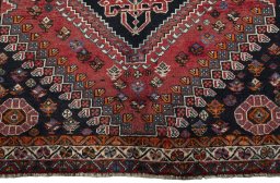 Central medallion detail of 2000s Shiraz rug from Iran / Persia