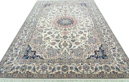 Surface texture of 2000s Nain rug with natural Wool and intricate pattern