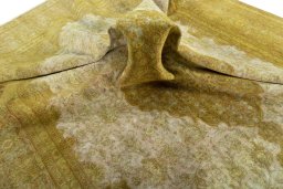 Surface texture of 1970s Vintage rug with natural Wool and intricate pattern