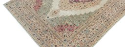Backside of handmade New Farahan rug showing knot structure and weave density