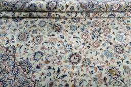 Close-up detail of 2000s Kashan rug from Iran / Persia showing Wool weave