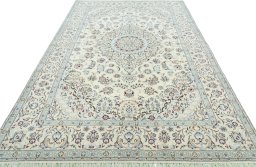Surface texture of 2000s Nain rug with natural Wool and intricate pattern