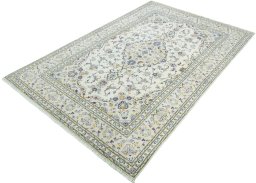 Corner detail of New Kashan rug showing border pattern and Wool pile