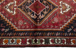 Full view of 2000s Shiraz rug from Iran / Persia, 163 × 116 cm in Red tones