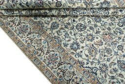 Close-up detail of 2000s Nain rug from Iran / Persia showing Wool weave