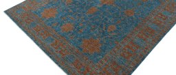 Backside of handmade New Farahan rug showing knot structure and weave density