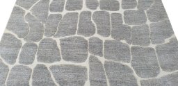 Backside of handmade New Morocco rug showing knot structure and weave density