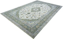 Corner detail of 2000s Kashan rug showing border pattern and Wool pile