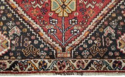 Close-up detail of 2000s Shiraz rug from Iran / Persia showing Wool weave