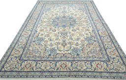 Surface texture of 2000s Nain rug with natural Wool and intricate pattern