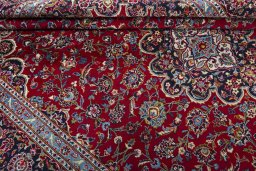 Close-up detail of 2000s Kashan rug from Iran / Persia showing Wool weave