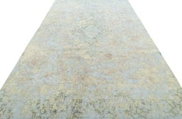 Surface texture of 1950s Vintage rug with natural Wool and intricate pattern