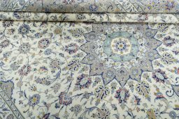Close-up detail of 2000s Kashan rug from Iran / Persia showing Wool weave