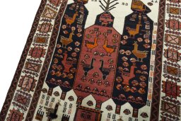 Backside of handmade 1930s Baloch rug showing knot structure and weave density