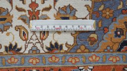Backside of handmade 2000s China Silk rug showing knot structure and weave density