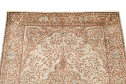 Surface texture of 1920s Istanbul Silk rug with natural Silk and intricate pattern